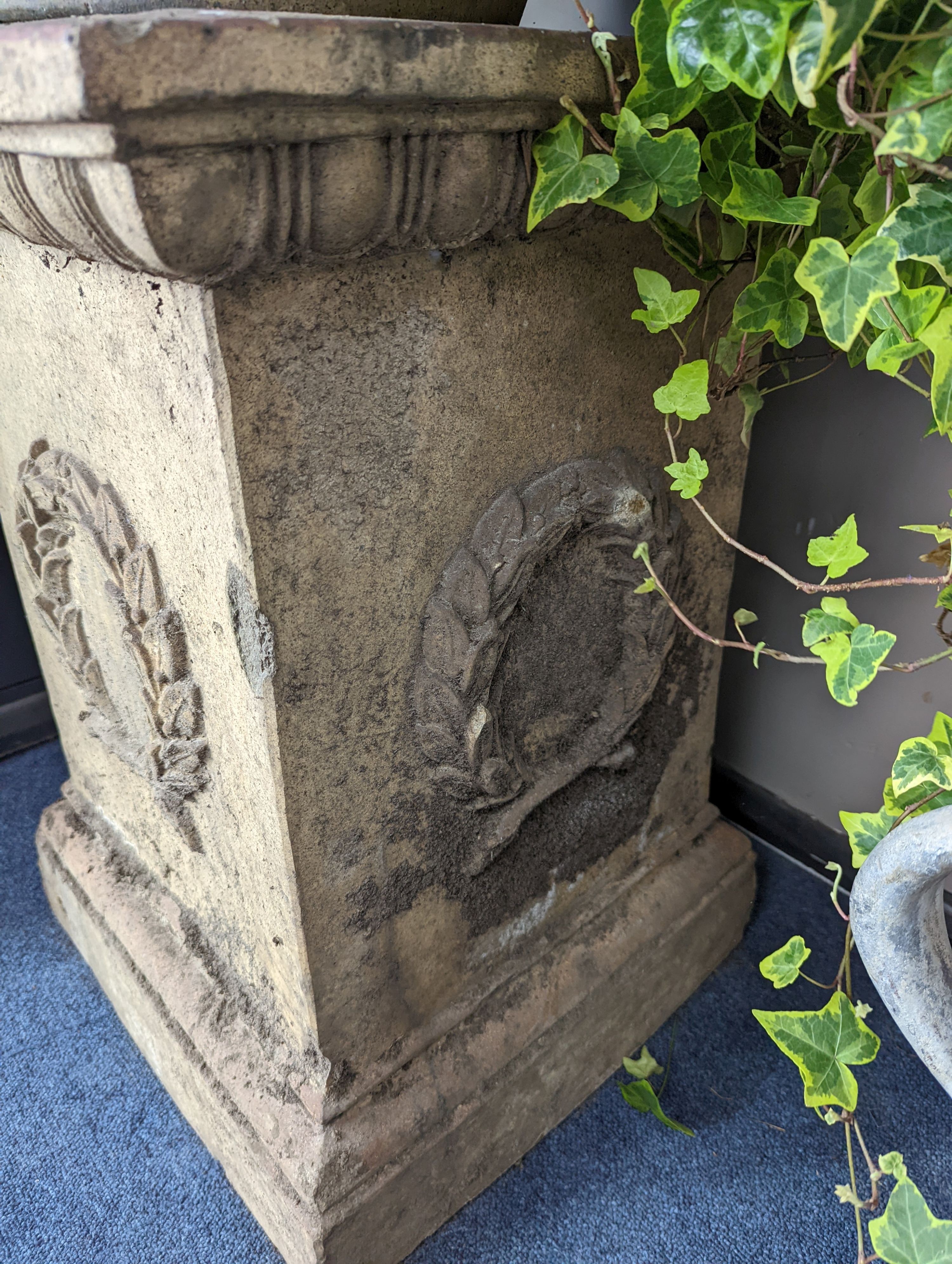 A pair of Victorian earthenware circular garden urns square plinth bases, diameter 58cm, height 96cm